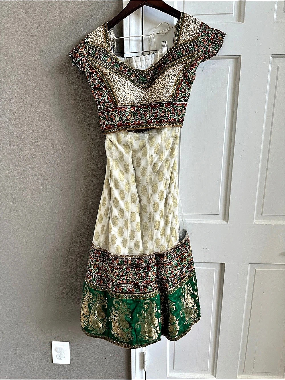 Embellished lengha in Green & Gold Like New